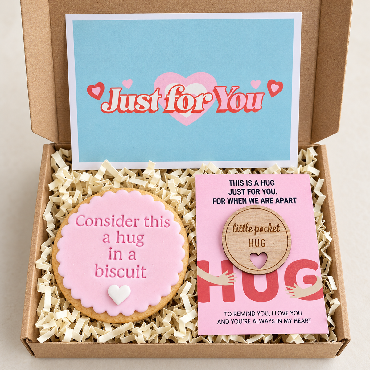 Pink hug in a biscuit and wooden pocket-hug keepsake in a letterbox gift box