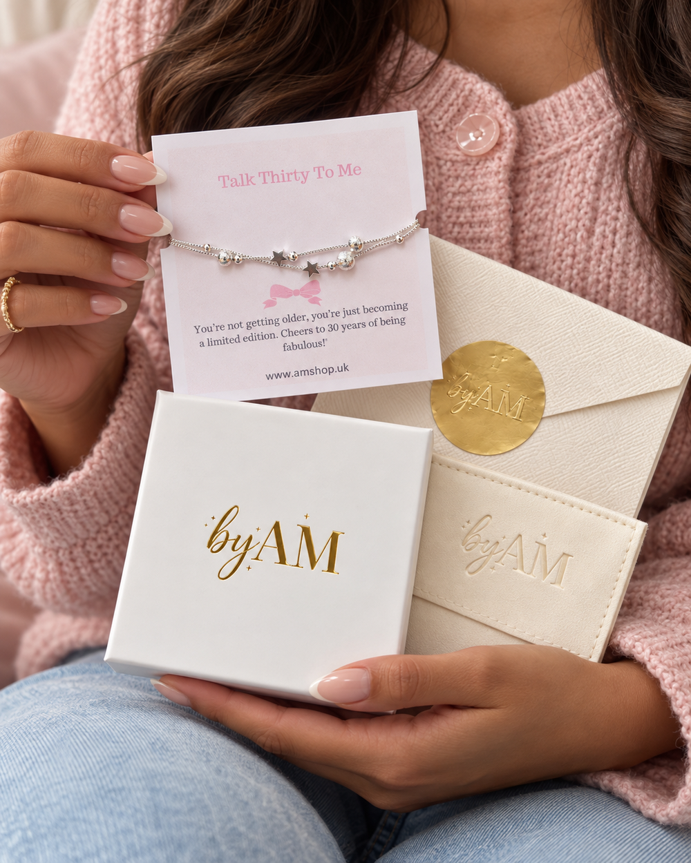 Example by AM bracelet packaging: sentiment card, envelope, pouch and gift box. Bracelet design and included packaging vary by range.