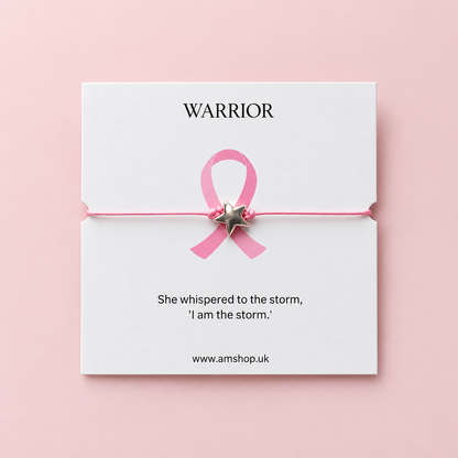 Star Warrior bracelet with a metallic star charm on a single pink cord.