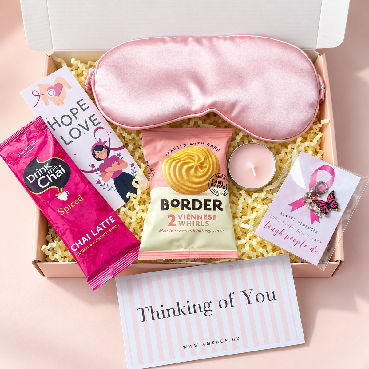 Here for You gift box with pink eye mask, chai latte, biscuits, tealight, bookmark, butterfly ribbon charm and gift card.