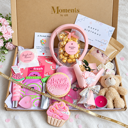 Large pink birthday pamper box presentation with birthday biscuits, headband, keepsake and pamper items