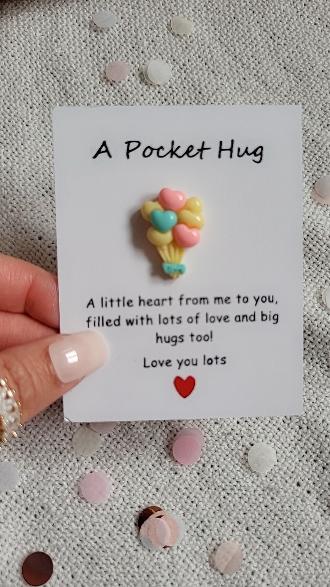 Flower-basket pocket hug keepsake shown in the pink birthday box
