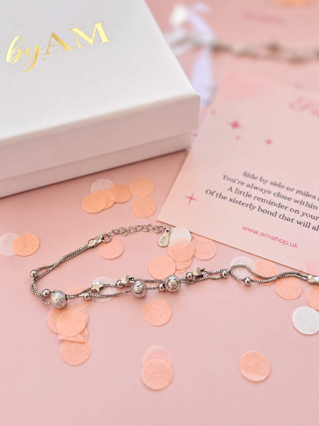 Sister bracelet beside BY AM jewellery gift box